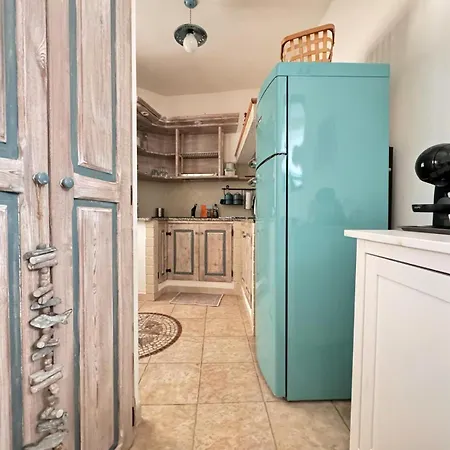 Casa Storica Hébergement de vacances SantʼAntìoco